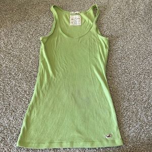 Hollister brand woman’s tank top; fitted long length in light green medium